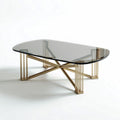 Mesa de café ovalada de vidro fumê com base em metal dourado 120 x 60 x 45cm